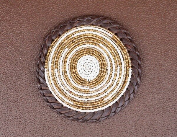 Durable Gold and White Beaded Coaster with Leather Trim