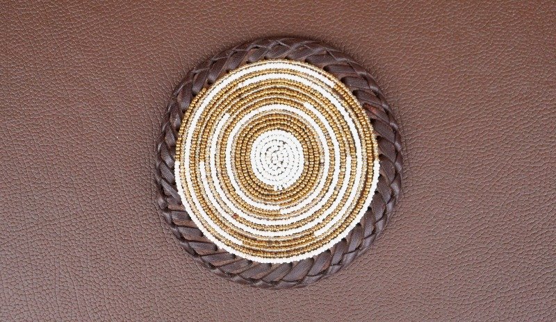 Durable Gold and White Beaded Coaster with Leather Trim