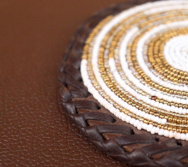 Durable Gold and White Beaded Coaster with Leather Trim