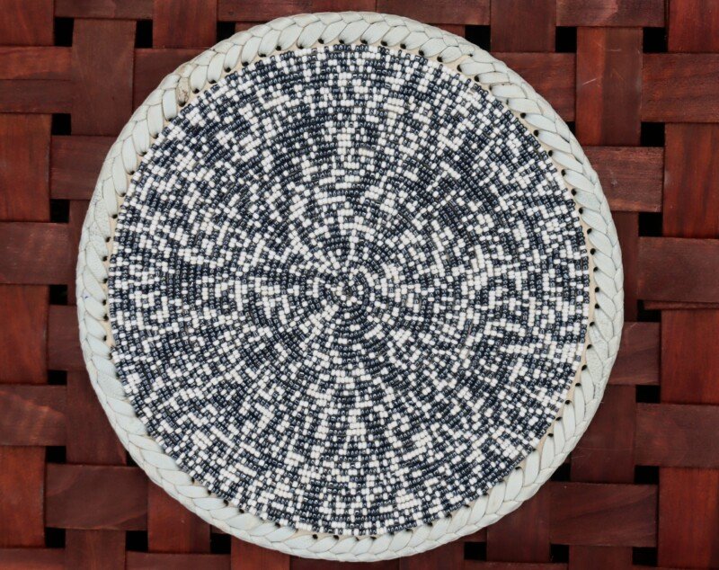 Handmade 13-inch black and white beaded placemat Handmade 13-inch black and white beaded placemat