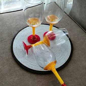 Hand beaded yellow and red wine glasses