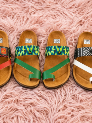 Cozy sandal arrangement on pink rug Vibrant Trio Ankara Cork Sandals - Set of 3 Handmade African Print Slides
